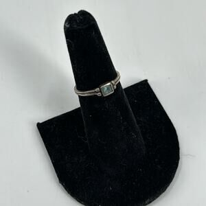 Small square cut sterling silver blue topaz ring